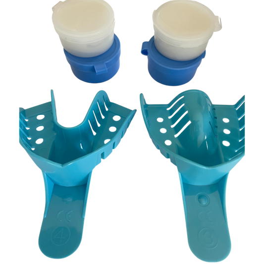 Two blue plastic trays with white dental on a white background